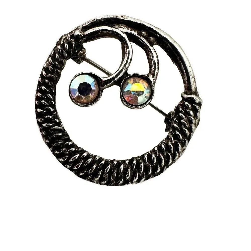 Silver tone and rhinestone vintage circle abstract brooch